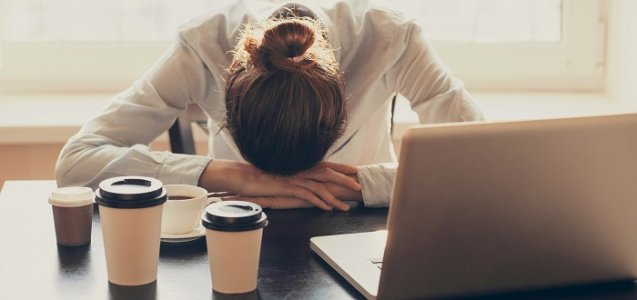 woman-asleep-at-her-desk-surrounded-by-coffee-2731.jpg