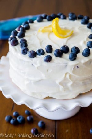 Deliciously-sweet-and-light-Lemon-Blueberry-Layer-Cake.-Tangy-cream-cheese-frosting-gives-each...jpg