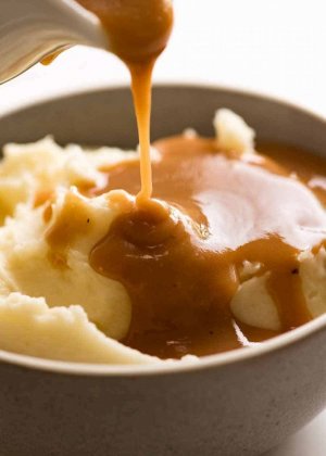 Pouring-gravy-over-mashed-potato.jpg