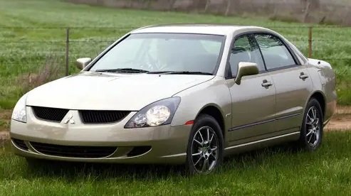 2003-Mitsubishi-Magna-Sedan-Beige-Press-Image-1001x565p.jpg