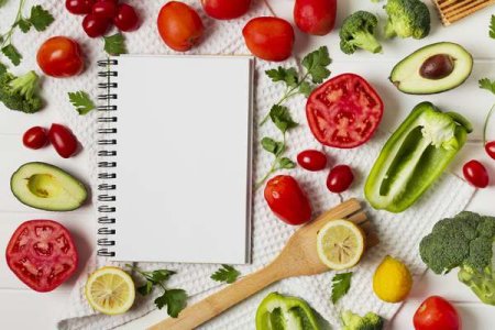 compressed-flat-lay-arrangement-with-vegetables-notebook.jpeg