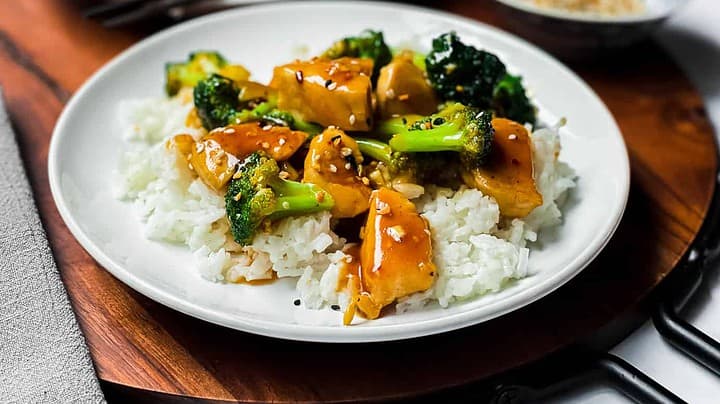 Closeup view of Chicken Broccoli on a plate with steamed rice