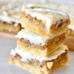 Pineapple Bars stacked on each other on a countertop.