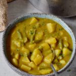 vegan potato curry with green beans in a bowl vegan potato curry with green beans in a bowl