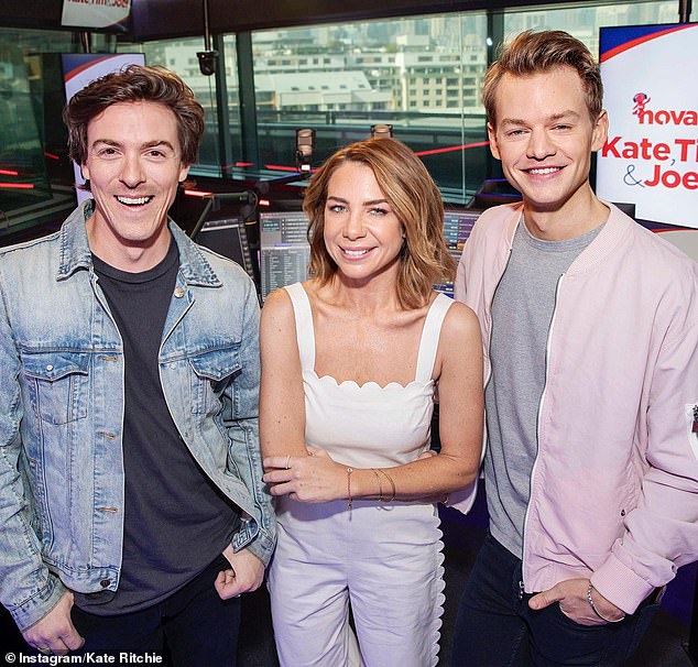 61668029-11140049-Radio_sources_say_Nova_FM_drive_host_Kate_Ritchie_centre_with_Ti-m-34_1661470795645.jpg