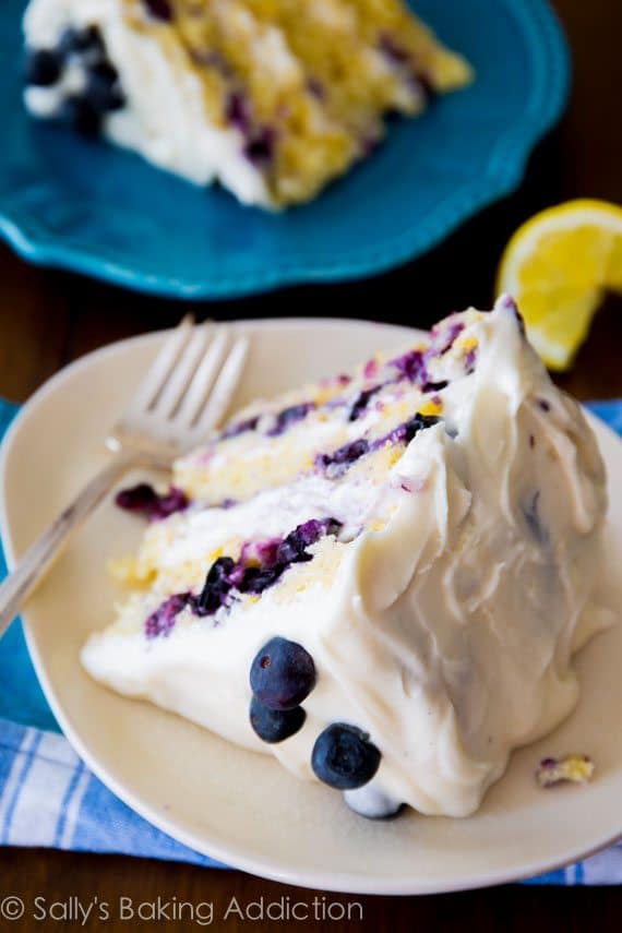 slice of lemon blueberry cake on a plate slice of lemon blueberry cake on a plate
